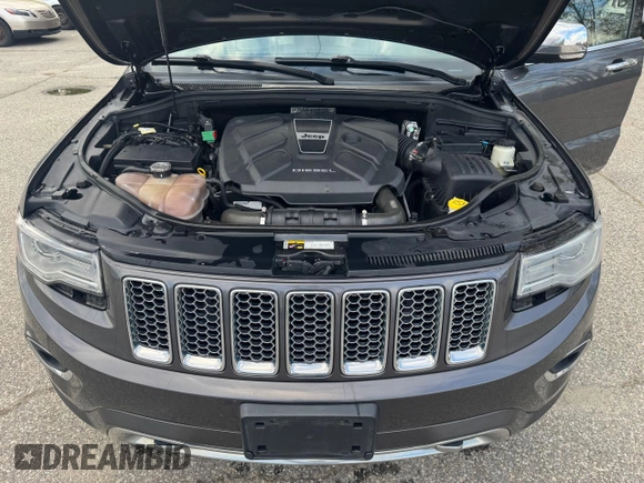 2014 Jeep Grand Cherokee Overland with VIN 1C4RJFCM8EC388963, listed as a Copart auction lot 56423685 with 190,146 mi miles and Clean Title. Bid and sale history available at DreamBid. Image 7.