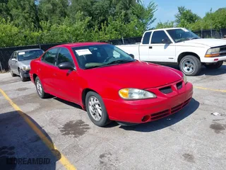 2004 Pontiac Grand Am SE with VIN 1G2NE52F24M636251, listed as a IAAI auction lot 39758466 with 302,095 mi miles. Bid and sale history available at carsss.com. Image 1.