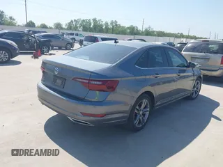 2021 Volkswagen Jetta S with VIN 3VWC57BU2MM048512, listed as a IAAI auction lot 40561743 with 67,028 mi miles and . Bid and sale history available at DreamBid. Image 4.