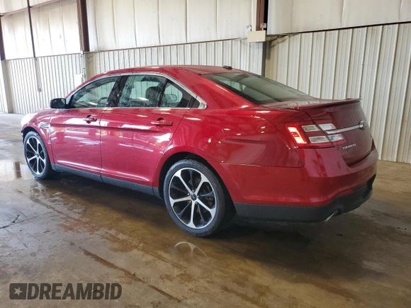 2015 Ford Taurus SEL with VIN 1FAHP2E83FG143653, listed as a Copart auction lot 59280645 with 77,048 mi miles and Salvage title. Bid and sale history available at DreamBid. Image 2.