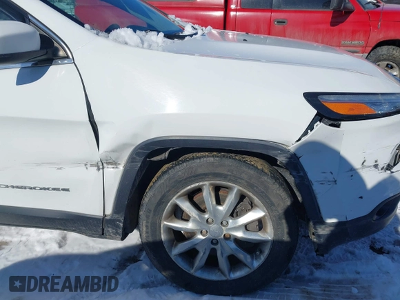 2015 Jeep Cherokee Limited with VIN 1C4PJMDS9FW718151, listed as a IAAI auction lot 41344018 with 124,185 mi miles and . Bid and sale history available at DreamBid. Image 17.