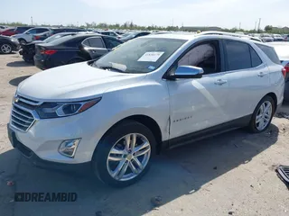 2018 Chevrolet Equinox Premier with VIN 2GNAXWEX3J6141427, listed as a IAAI auction lot 41830179 with 76,707 mi miles and . Bid and sale history available at carsss.com. Image 16.