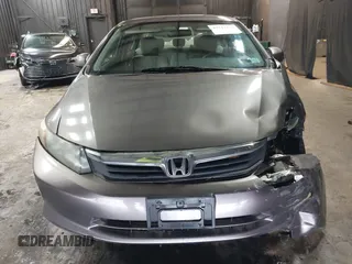 2012 Honda Civic LX z VIN 19XFB2F59CE373830, wystawiony jako IAAI lot #42312118 z przebiegiem 106 541 mil mil oraz . Historia ofert i sprzedaży dostępna na DreamBid. Obrazek 12.