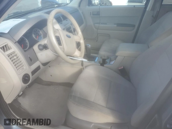 2011 Ford Escape Hybrid with VIN 1FMCU5K37BKC69587, listed as a Copart auction lot 68494964 with 126,353 mi miles and Salvage title. Bid and sale history available at DreamBid. Image 7.