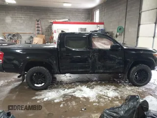 2016 Toyota Tacoma SR with VIN 3TMCZ5AN5GM037336, listed as a IAAI auction lot 41599492 with 76,262 mi miles. Bid and sale history available at carsss.com. Image 13.