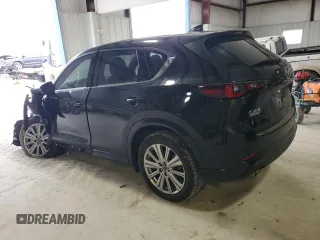 2023 Mazda CX-5 Signature with VIN JM3KFBXY6P0235017, listed as a Copart auction lot 45979615 with 14,487 mi miles and Salvage Title. Bid and sale history available at carsss.com. Image 2.