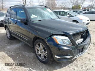 2015 Mercedes-Benz GLK with VIN WDCGG8JB0FG402300, listed as a IAAI auction lot 41969142 with 135,806 mi miles. Bid and sale history available at carsss.com. Image 1.