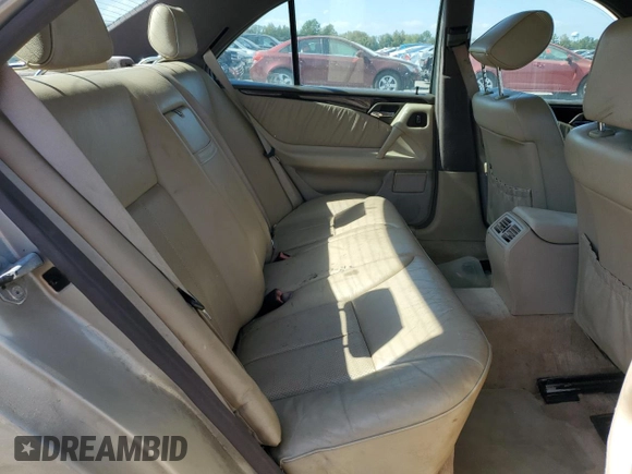 1997 Mercedes-Benz E-Class with VIN WDBJF55F8VJ031008, listed as a Copart auction lot 74305684 with 308,905 mi miles and Clean Title. Bid and sale history available at carsss.com. Image 10.