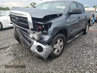 2010 Toyota Tundra with VIN 5TFDW5F11AX112876, listed as a Copart auction lot 61421065 with 214,071 mi miles and Salvage title. Bid and sale history available at DreamBid. Image 1.