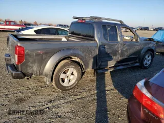 2007 Nissan Frontier SE with VIN 1N6AD09W47C438493, listed as a Copart auction lot 82595824 with 97,541 mi miles and Salvage title. Bid and sale history available at DreamBid. Image 3.