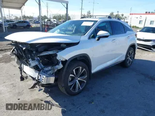 2022 Lexus RX with VIN 2T2HZMAA1NC232512, listed as a IAAI auction lot 41375711 with 27,599 mi miles. Bid and sale history available at carsss.com. Image 17.