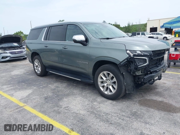 2023 Chevrolet Suburban Premier with VIN 1GNSCFKD2PR377493, listed as a IAAI auction lot 42426988 with 71,365 mi miles and . Bid and sale history available at DreamBid. Image 1.