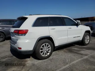 2021 Jeep Grand Cherokee Laredo E with VIN 1C4RJEAGXMC719497, listed as a Copart auction lot 60830315 with 3,873 mi miles and Salvage title. Bid and sale history available at DreamBid. Image 3.