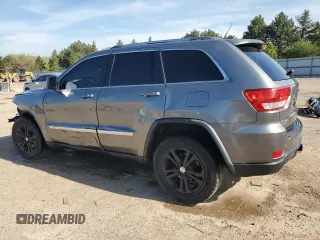 2011 Jeep Grand Cherokee Laredo with VIN 1J4RR4GGXBC642759, listed as a Copart auction lot 55767575 with 144,104 mi miles and Salvage title. Bid and sale history available at DreamBid. Image 2.