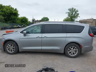 2020 Chrysler Pacifica Touring L with VIN 2C4RC1BG2LR127986, listed as a IAAI auction lot 42419518 with 107,618 mi miles and . Bid and sale history available at DreamBid. Image 14.
