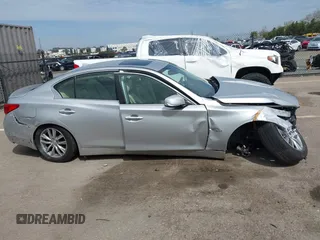 2017 Infiniti Q50 Premium z VIN JN1EV7AP5HM731123, wystawiony jako IAAI lot #41795396 z przebiegiem 151 948 mil mil oraz . Historia ofert i sprzedaży dostępna na DreamBid. Obrazek 13.