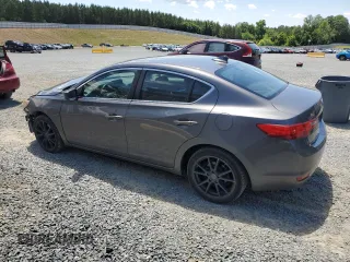 2014 Acura ILX Premium z VIN 19VDE1F50EE003421, wystawiony jako Copart lot #57580215 z przebiegiem 199 247 mil mil oraz Szkoda całkowita • Salvage title. Historia ofert i sprzedaży dostępna na DreamBid. Obrazek 2.