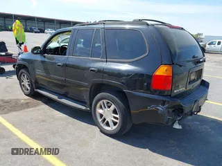 2007 GMC Envoy Denali with VIN 1GKES63MX72103849, listed as a IAAI auction lot 41904190 with 237,261 mi miles. Bid and sale history available at carsss.com. Image 3.