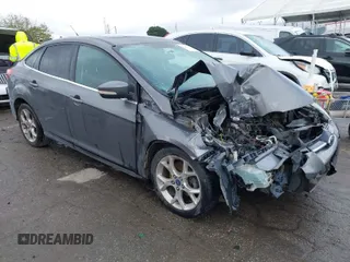 2013 Ford Focus Titanium with VIN 1FADP3J2XDL270393, listed as a IAAI auction lot 41814775 with 76,907 mi miles and . Bid and sale history available at carsss.com. Image 1.