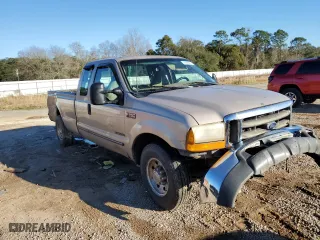 1999 Ford Super Duty F-250 XL with VIN 1FTNX20F9XEE66766, listed as a Copart auction lot 46595795 with 571,503 mi miles and Salvage Title. Bid and sale history available at carsss.com. Image 4.