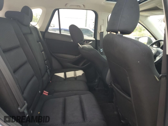 2014 Mazda CX-5 Touring with VIN JM3KE4CYXE0409558, listed as a Copart auction lot 51762995 with 91,082 mi miles and Salvage Title. Bid and sale history available at carsss.com. Image 11.