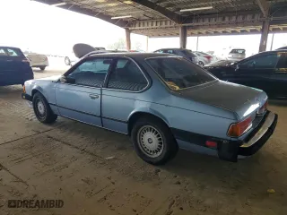1985 BMW 6 Series 635CSi with VIN WBAEC8400F0611576, listed as a Copart auction lot 52735165 with 152,898 mi miles and Salvage Title. Bid and sale history available at carsss.com. Image 2.