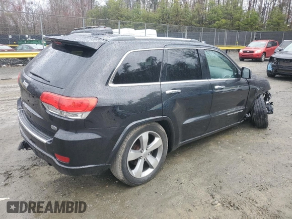 2014 Jeep Grand Cherokee Overland with VIN 1C4RJFCG1EC587458, listed as a Copart auction lot 50213015 with 124,266 mi miles and Salvage Title. Bid and sale history available at carsss.com. Image 3.
