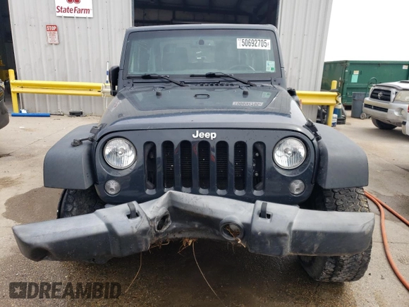 2017 Jeep Wrangler Sport with VIN 1C4AJWAGXHL540496, listed as a Copart auction lot 50692705 with 115,042 mi miles and Salvage Title. Bid and sale history available at DreamBid. Image 5.