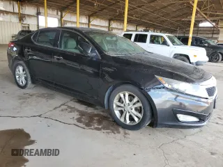 2013 Kia Optima EX z VIN 5XXGN4A75DG253693, wystawiony jako Copart lot #59227785 z przebiegiem 191 062 mil mil oraz Szkoda całkowita • Salvage title. Historia ofert i sprzedaży dostępna na DreamBid. Obrazek 4.