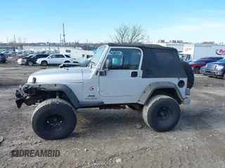 2003 Jeep Wrangler X with VIN 1J4FA39S33P363153, listed as a IAAI auction lot 41584805 with 160,676 mi miles. Bid and sale history available at carsss.com. Image 15.