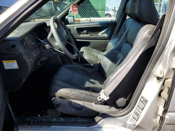 2000 Volvo S70 z VIN YV1LS61J4Y2630471, wystawiony jako Copart lot #72342454 z przebiegiem 167 733 mil mil oraz Nie do naprawy • Non repairable. Historia ofert i sprzedaży dostępna na DreamBid. Obrazek 7.