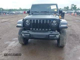 2023 Jeep Gladiator Overland with VIN 1C6JJTFM9PL593659, listed as a IAAI auction lot 42470253 with 34,374 mi miles and . Bid and sale history available at DreamBid. Image 11.