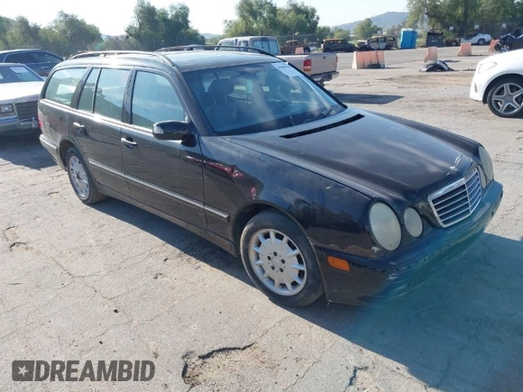 2001 Mercedes-Benz E-Class with VIN WDBJH65J31B381879, listed as a IAAI auction lot 41855504 with 153,667 mi miles. Bid and sale history available at carsss.com. Image 1.