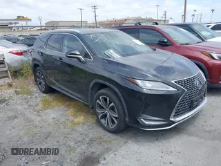 2020 Lexus RX with VIN JTJHZKEA3L2016365, listed as a IAAI auction lot 41615430 with 33,853 mi miles. Bid and sale history available at carsss.com. Image 1.