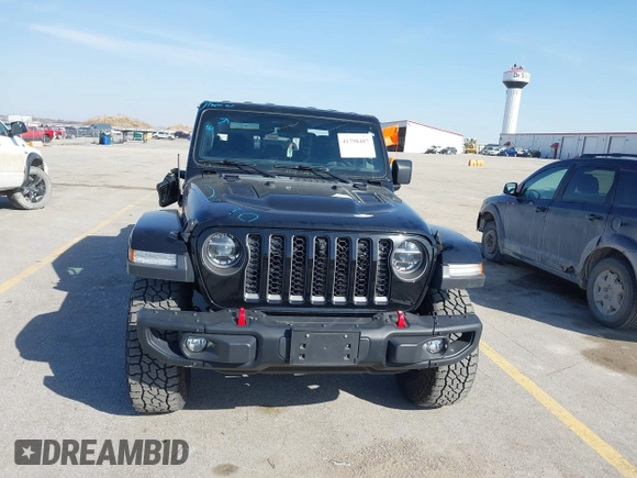 2020 Jeep Gladiator Rubicon with VIN 1C6JJTBG9LL152141, listed as a IAAI auction lot 41798487 with 78,585 mi miles and . Bid and sale history available at DreamBid. Image 6.