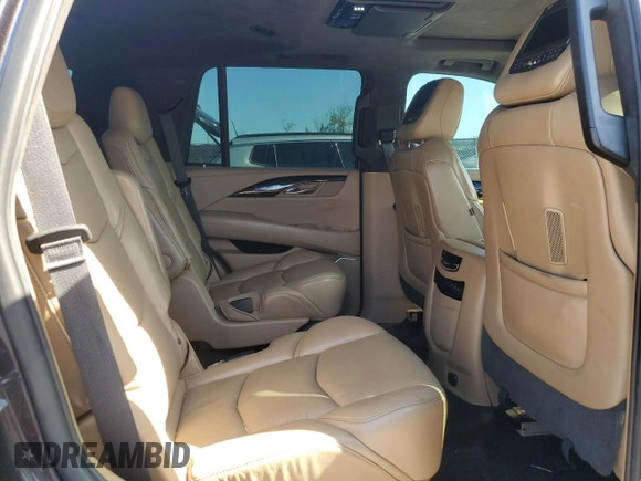 2018 Cadillac Escalade Platinum z VIN 1GYS4DKJ4JR187437, wystawiony jako Copart lot #52129915 z przebiegiem 70 128 mil mil oraz Czysty tytuł • Clean title. Historia ofert i sprzedaży dostępna na DreamBid. Obrazek 11.