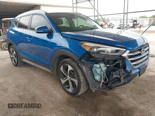 2018 Hyundai Tucson Sport z VIN KM8J33AL0JU803368, wystawiony jako IAAI lot #41937235 z przebiegiem 64 163 mil mil oraz . Historia ofert i sprzedaży dostępna na DreamBid. Obrazek 1.