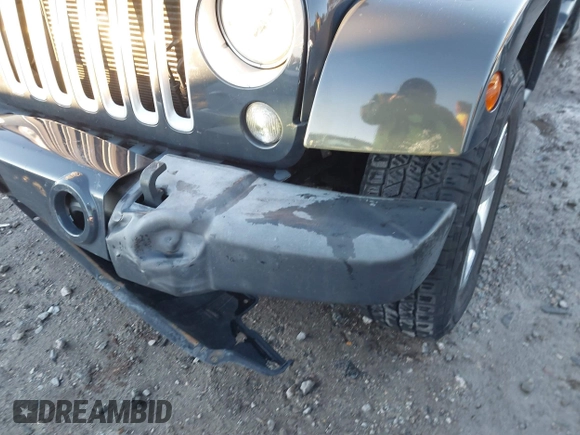 2017 Jeep Wrangler Unlimited Sahara with VIN 1C4BJWEGXHL686766, listed as a IAAI auction lot 41305319 with 97,806 mi miles. Bid and sale history available at carsss.com. Image 17.