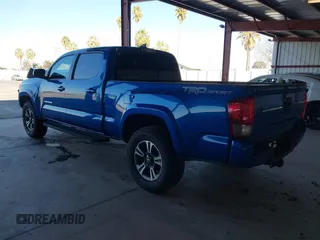2017 Toyota Tacoma SR5 with VIN 3TMBZ5DN1HM009204, listed as a IAAI auction lot 41301765 with 129,923 mi miles and . Bid and sale history available at DreamBid. Image 3.