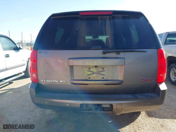 2013 GMC Yukon XL SLT with VIN 1GKS2KE70DR303872, listed as a IAAI auction lot 41659911 with 199,202 mi miles. Bid and sale history available at carsss.com. Image 16.