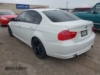 2011 BMW 3 Series 335i with VIN WBAPM5C54BE435453, listed as a IAAI auction lot 42048082 with 156,706 mi miles. Bid and sale history available at carsss.com. Image 3.
