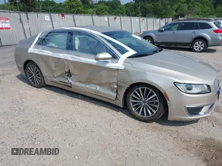 2017 Lincoln MKZ Hybrid Premiere z VIN 3LN6L5KU9HR657000, wystawiony jako IAAI lot #42457457 z przebiegiem Nie podano mil oraz . Historia ofert i sprzedaży dostępna na DreamBid. Obrazek 1.