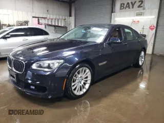 2015 BMW 7 Series 750i xDrive with VIN WBAYB6C53FD225423, listed as a Copart auction lot 78827414 with 69,780 mi miles and Salvage Title. Bid and sale history available at carsss.com. Image 1.