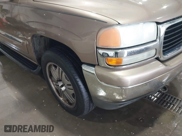 2004 GMC Yukon SLT with VIN 1GKEK13Z84R265500, listed as a IAAI auction lot 41412544 with 259,575 mi miles. Bid and sale history available at carsss.com. Image 6.