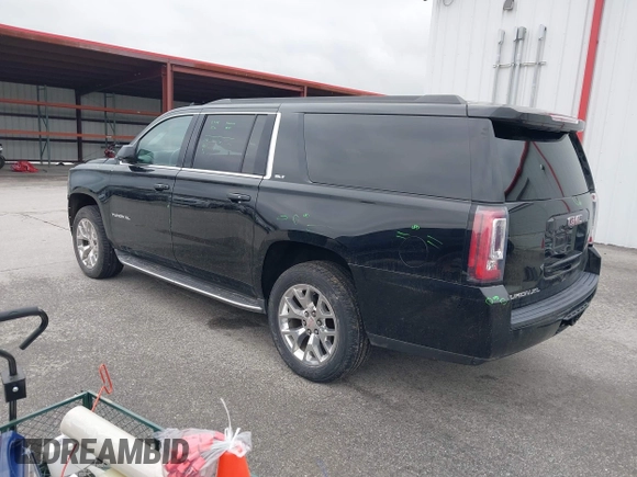 2015 GMC Yukon XL SLT with VIN 1GKS2HKC6FR746809, listed as a IAAI auction lot 41559570 with 144,401 mi miles. Bid and sale history available at carsss.com. Image 3.