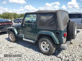 2001 Jeep Wrangler Sahara with VIN 1J4FA59S61P373670, listed as a Copart auction lot 74060614 with 176,111 mi miles and Clean Title. Bid and sale history available at carsss.com. Image 2.