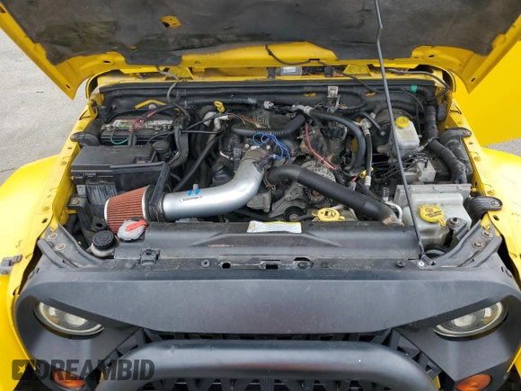 2009 Jeep Wrangler Unlimited Rubicon with VIN 1J8GA69109L761089, listed as a Copart auction lot 57975985 with 195,530 mi miles and Salvage title. Bid and sale history available at DreamBid. Image 12.
