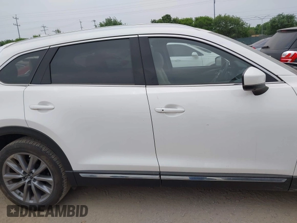 2023 Mazda CX-9 Grand Touring с VIN JM3TCBDY0P0634099, выставлен на аукционе IAAI как лот 41943704 с пробегом 5 615 миль миль и . История ставок и продаж доступна на DreamBid. Изображение 13.