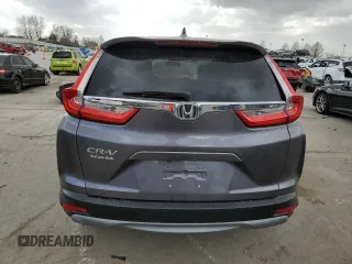 2018 Honda CR-V EX with VIN 7FARW1H51JE052272, listed as a Copart auction lot 49498945 with 61,324 mi miles and Salvage Title. Bid and sale history available at DreamBid. Image 6.