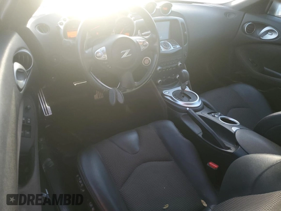 2014 Nissan 370Z Touring with VIN JN1AZ4FH4EM620092, listed as a Copart auction lot 77439254 with 38,662 mi miles and Salvage Title. Bid and sale history available at DreamBid. Image 8.